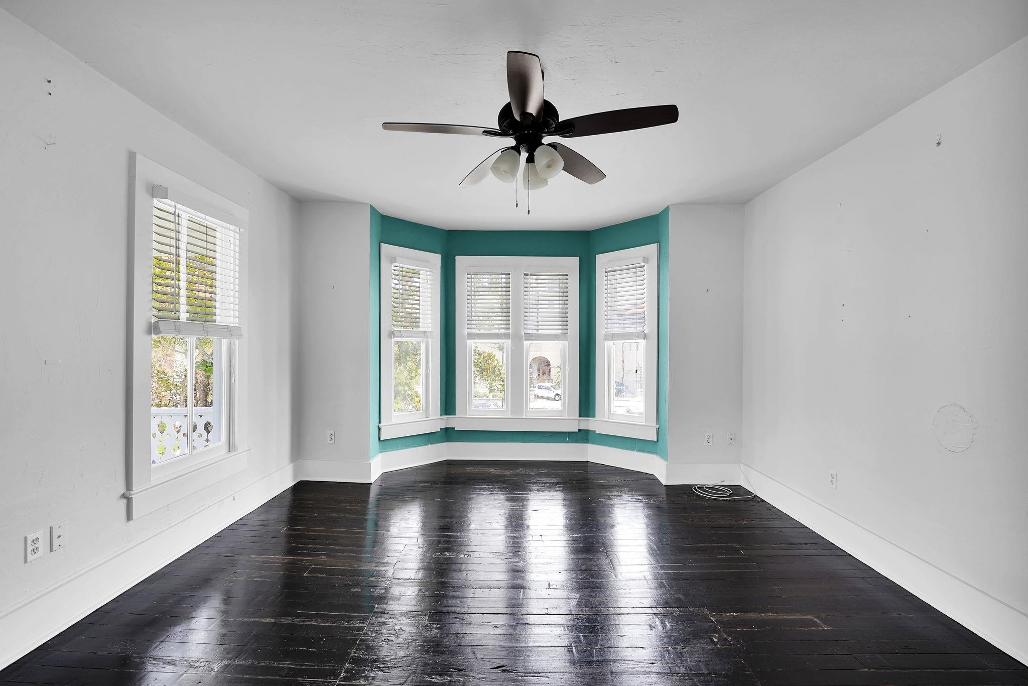 75 Cedar Street St. Augustine, FL 32084 - Photo 33 of 56 wooden floor in an empty room with a window