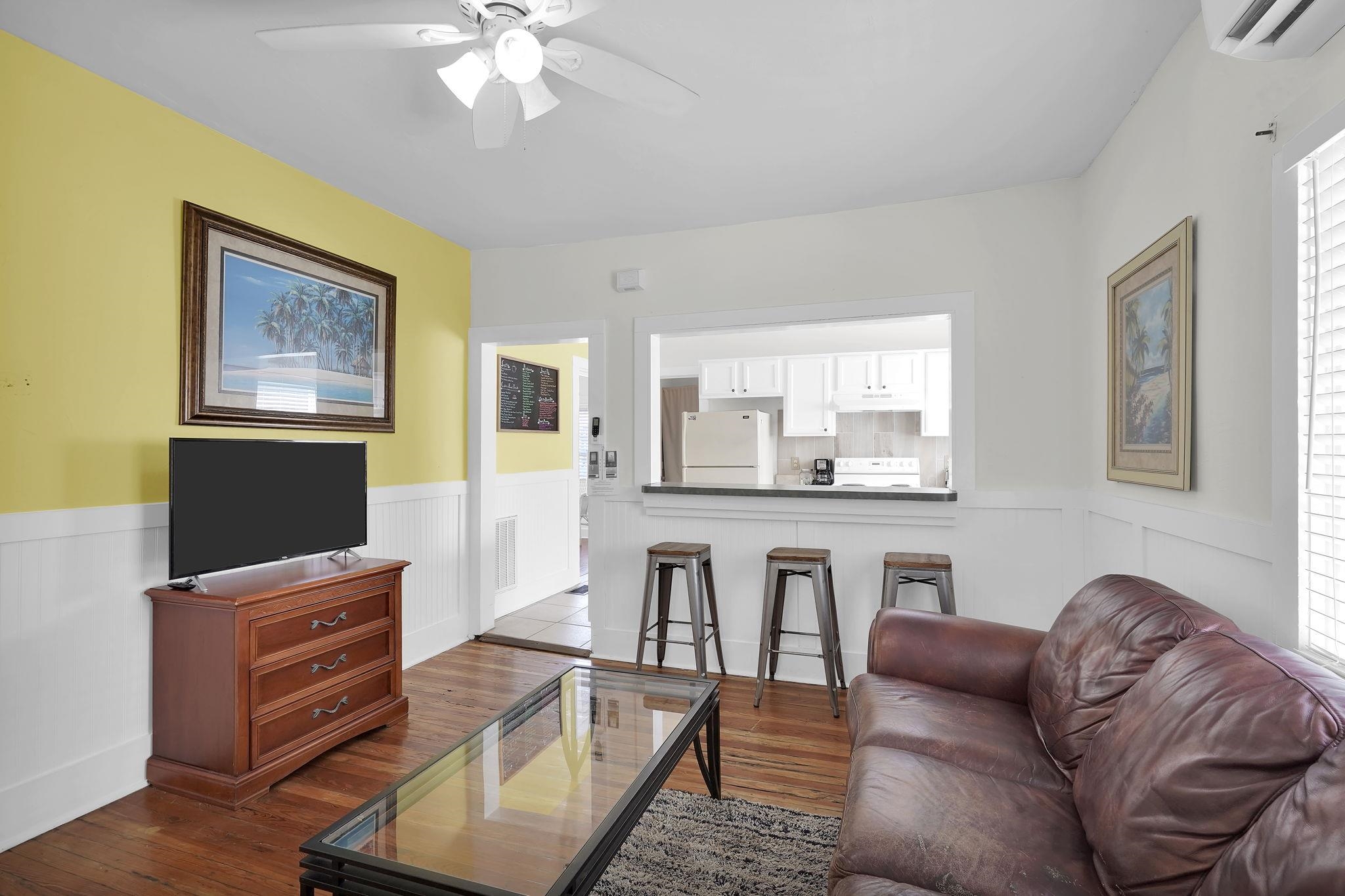 75 Cedar Street St. Augustine, FL 32084 - Photo 37 of 56 a living room with furniture and a flat screen tv