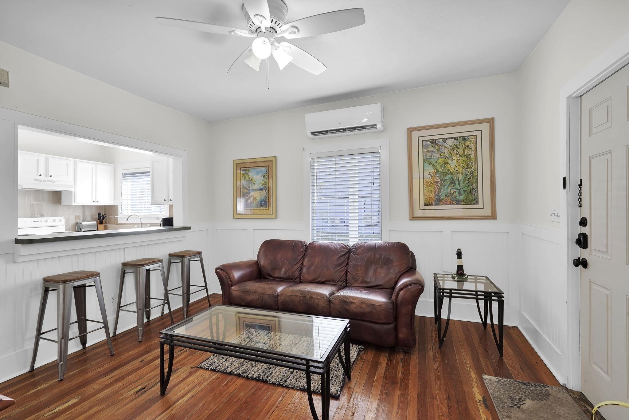 75 Cedar Street St. Augustine, FL 32084 - Photo 38 of 56 a living room with furniture and a wooden floor