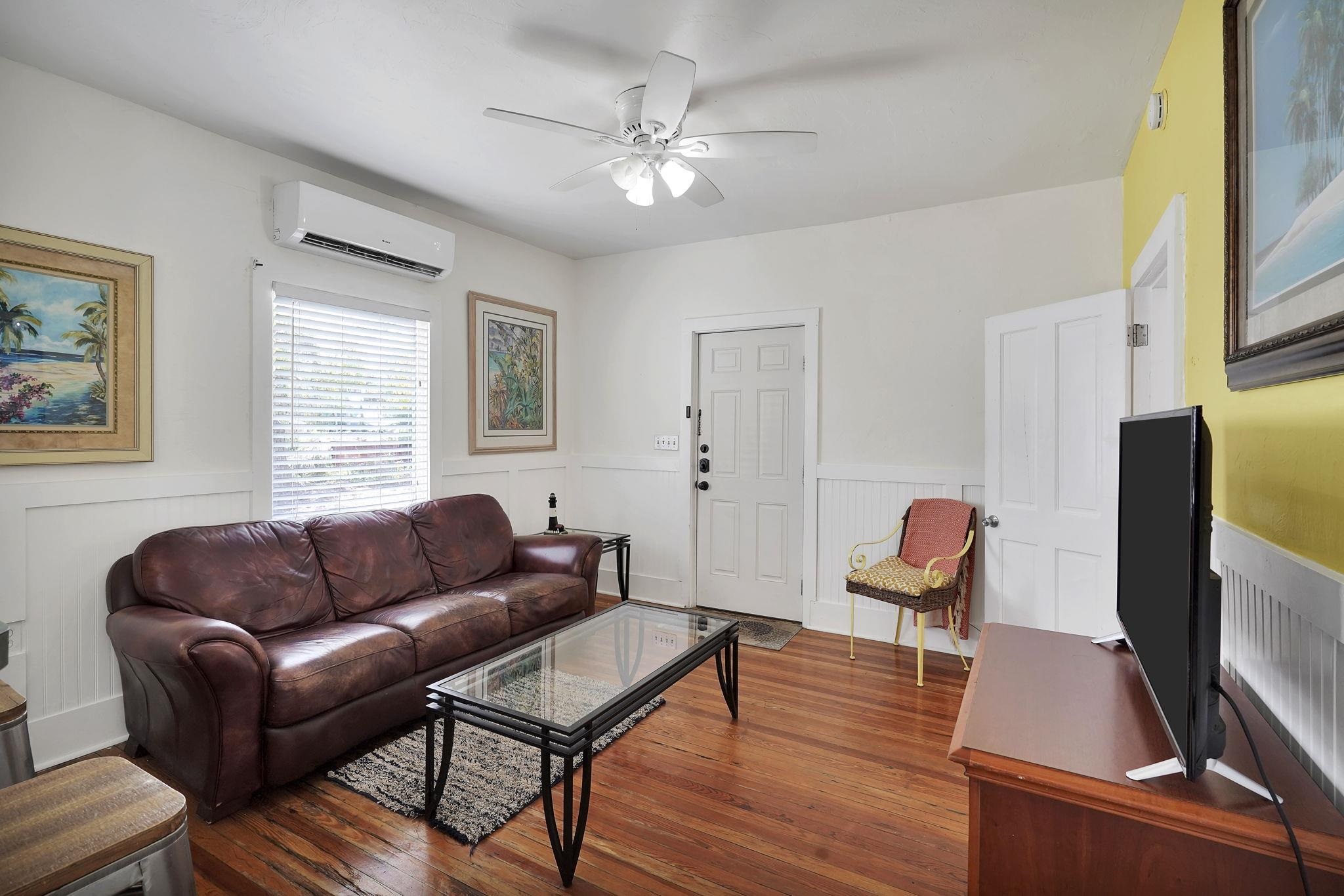 75 Cedar Street St. Augustine, FL 32084 - Photo 39 of 56 a living room with furniture and a flat screen tv