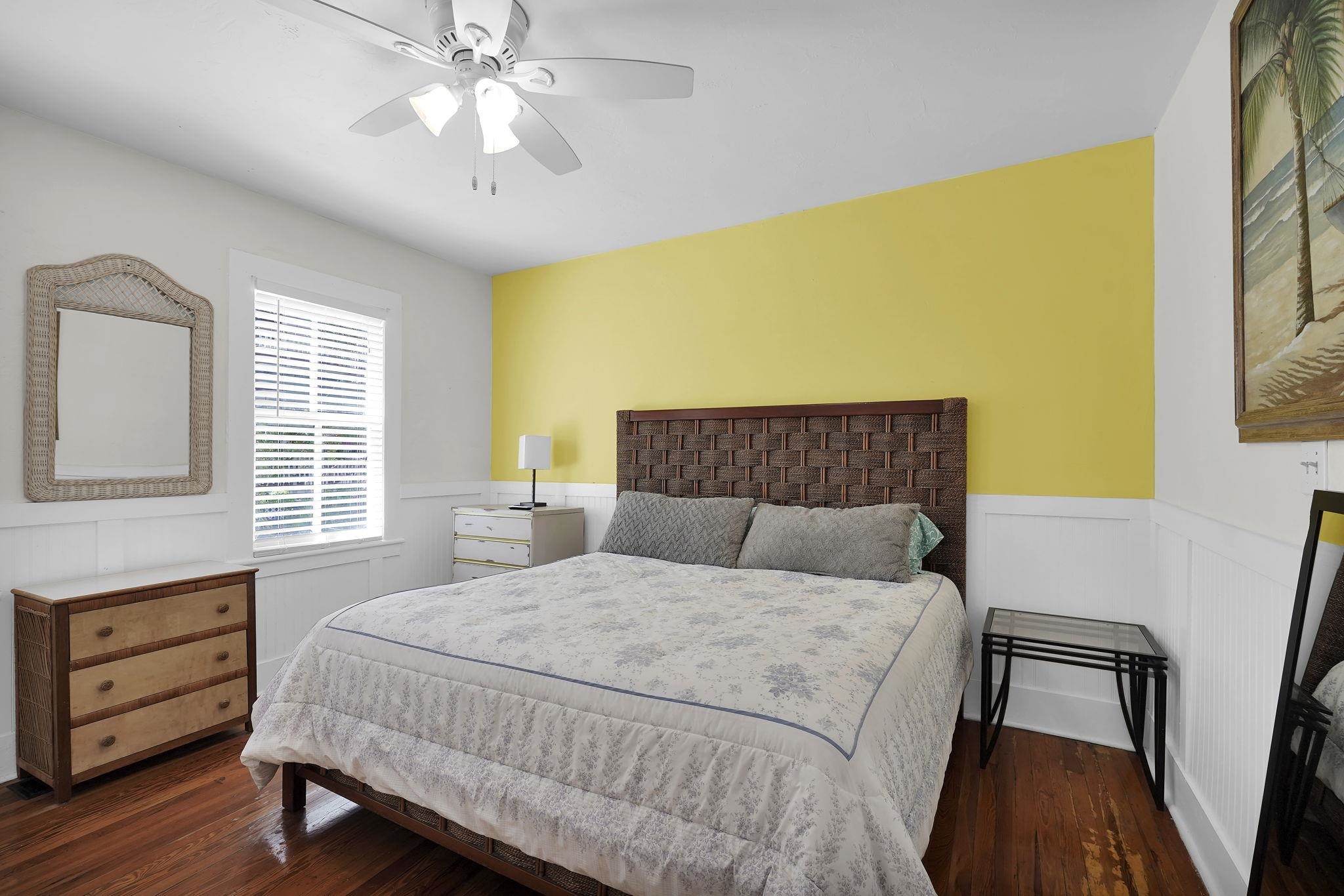 75 Cedar Street St. Augustine, FL 32084 - Photo 42 of 56 a bedroom with a bed and a dresser