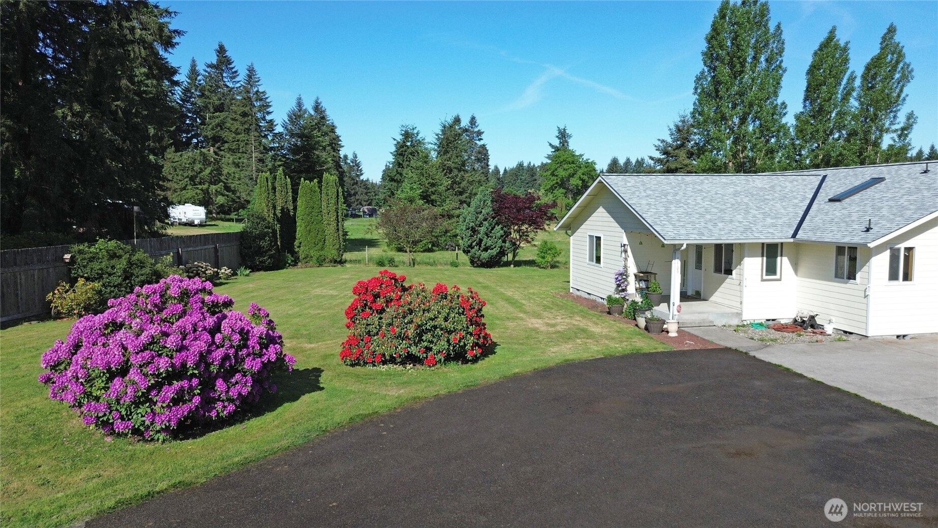 17103 Camas Run Lane Southwest Rochester, WA 98579 - Photo 5 of 40 a view of a house with a garden and pathway