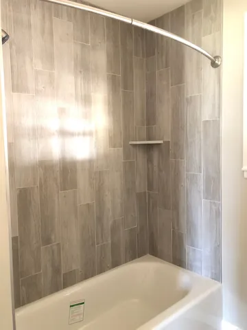 a bathroom with a bathtub