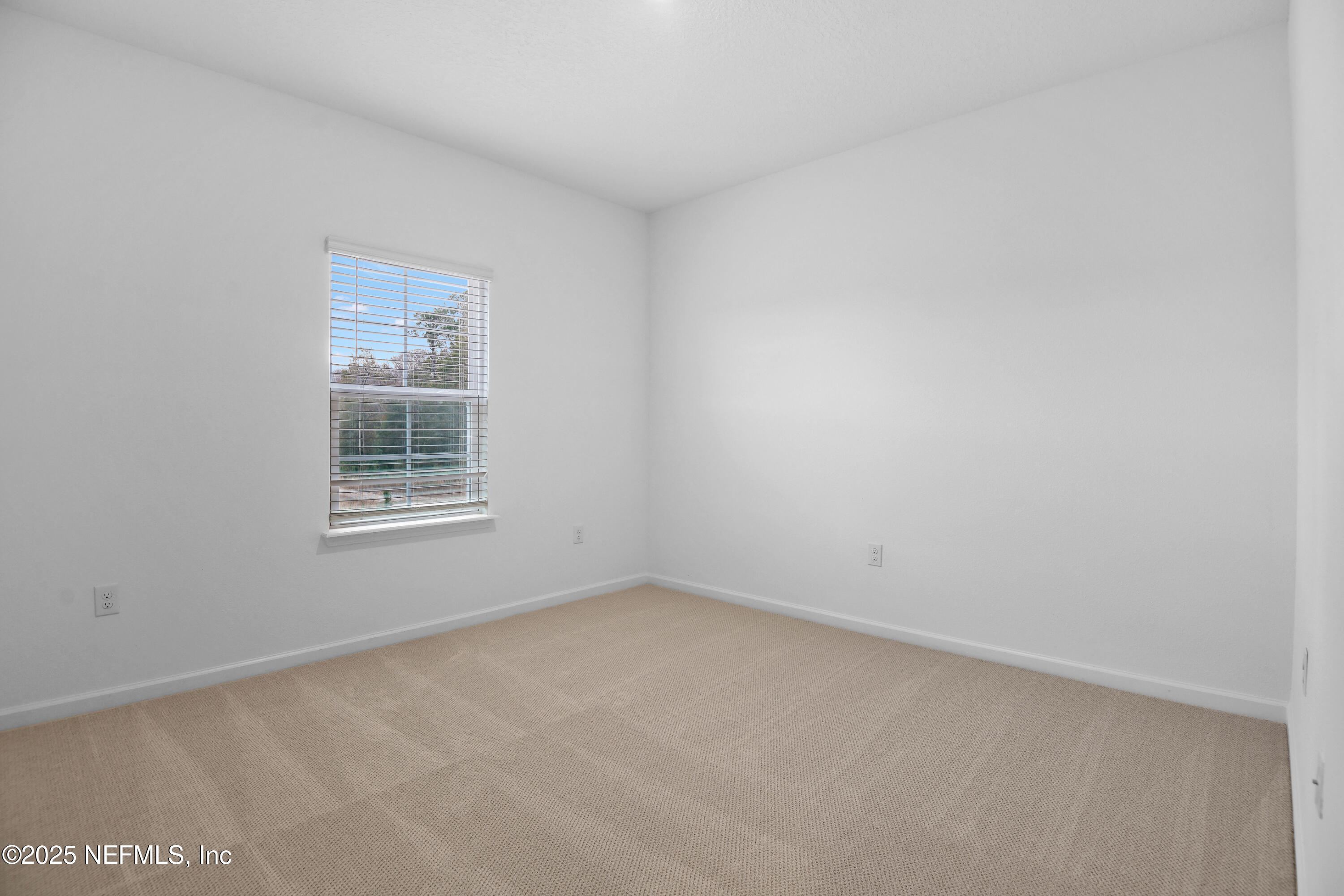 45 Bird Watch Court St. Augustine, FL 32092 - Photo 15 of 37 an empty room with windows