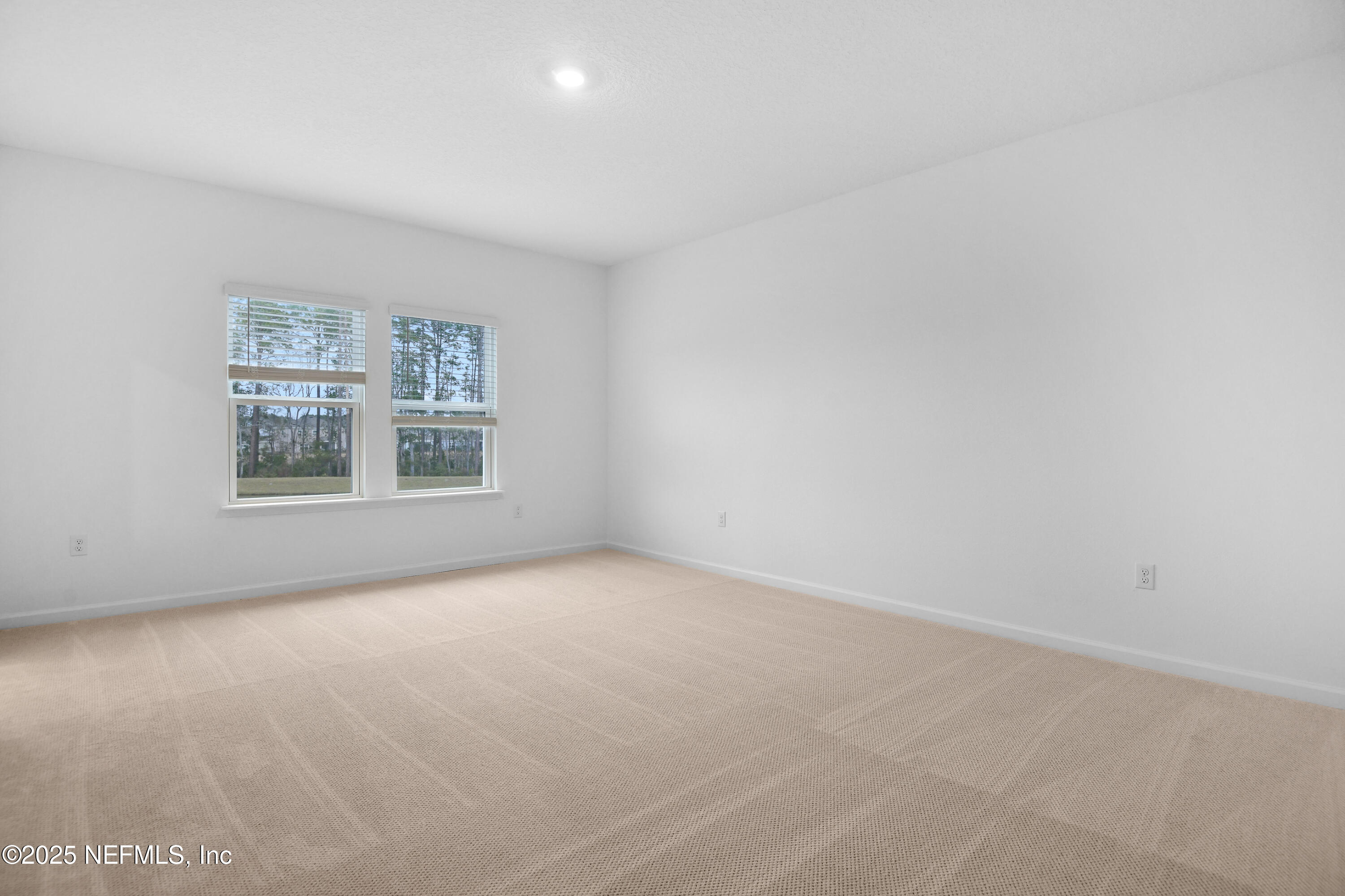 45 Bird Watch Court St. Augustine, FL 32092 - Photo 17 of 37 an empty room with windows