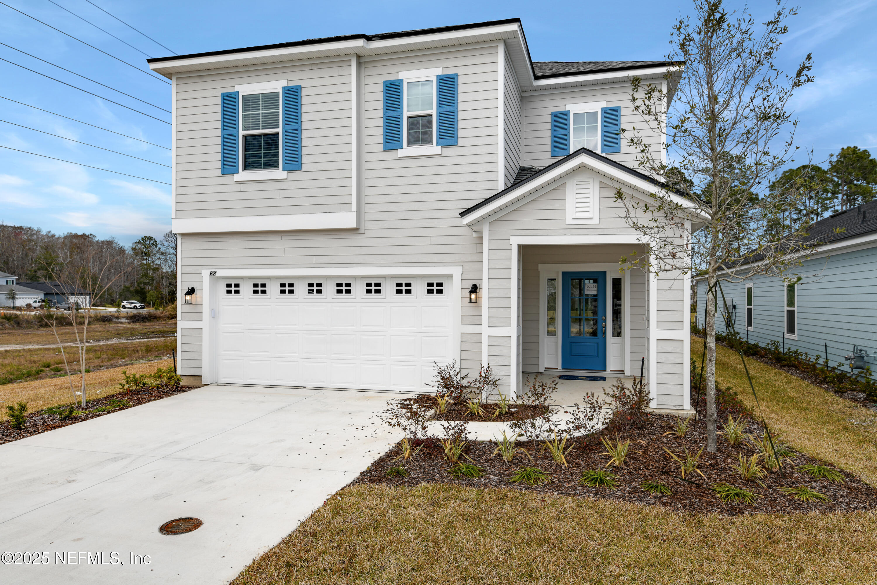 45 Bird Watch Court St. Augustine, FL 32092 - Photo 2 of 37 a view of a house with backyard and sitting area