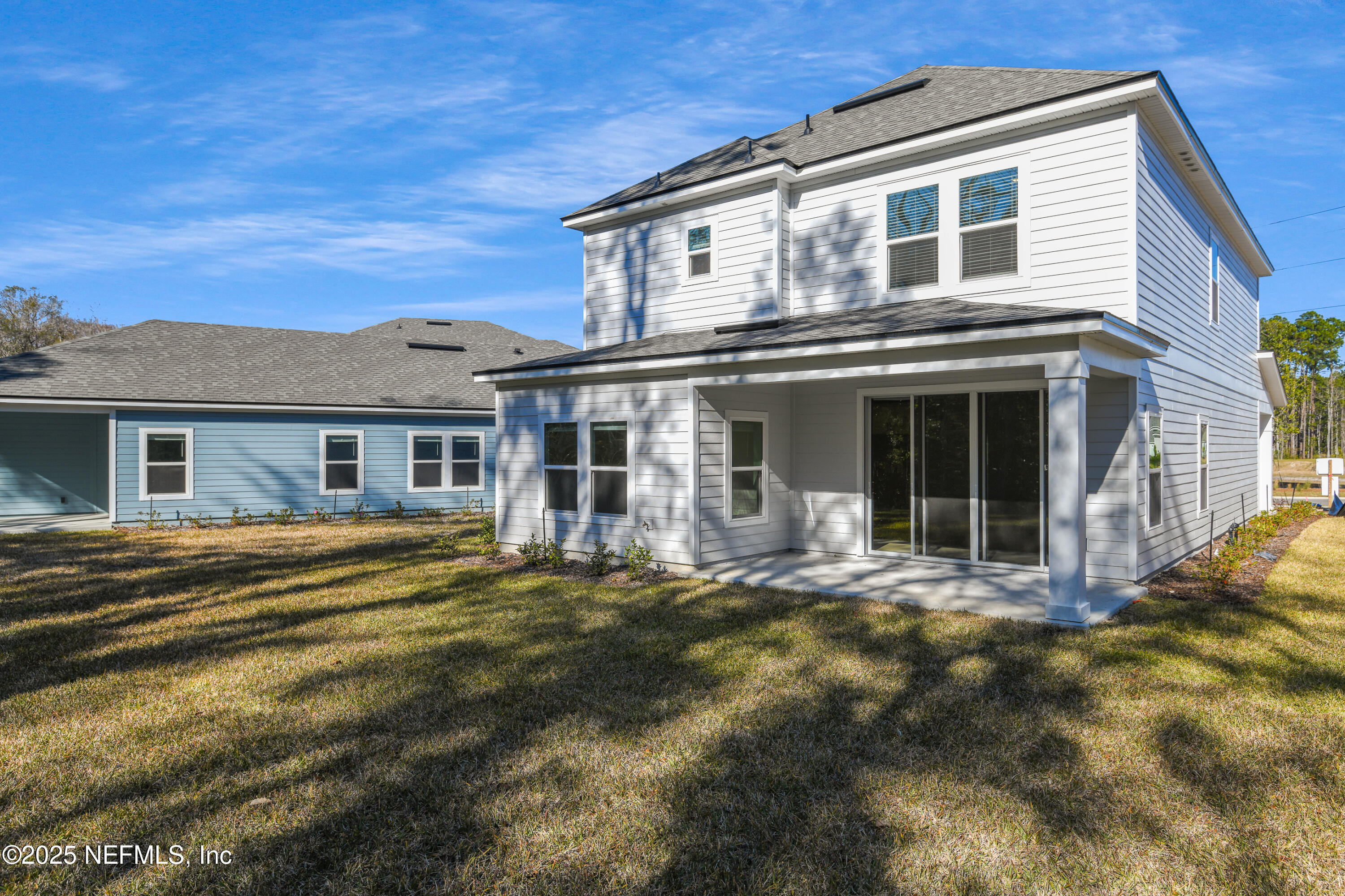 45 Bird Watch Court St. Augustine, FL 32092 - Photo 4 of 37 a front view of a house with a garden