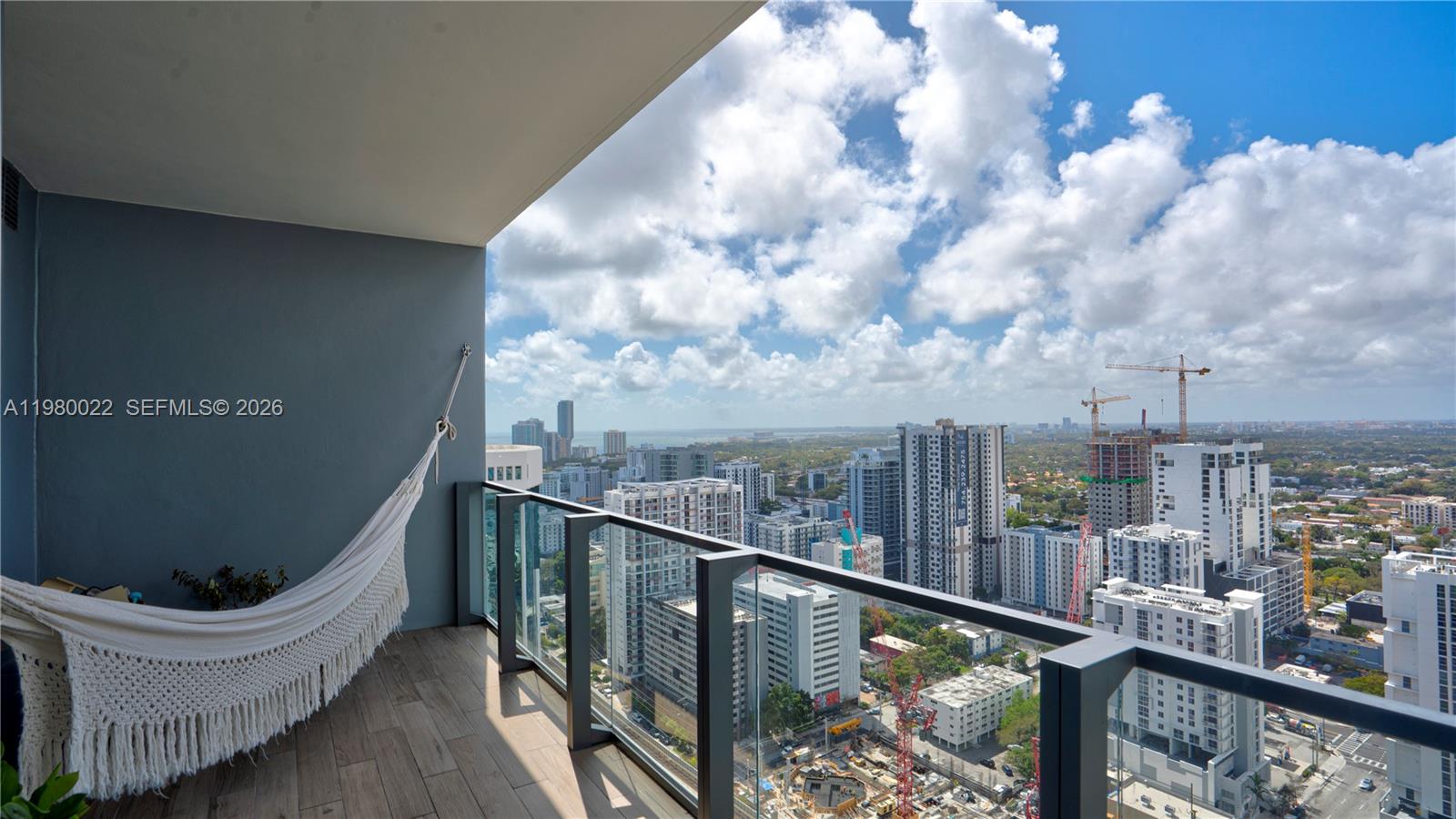 88 Southwest 7th Street, Unit 2706 Miami, FL 33130 - Photo 6 of 58 a view of a balcony with city view