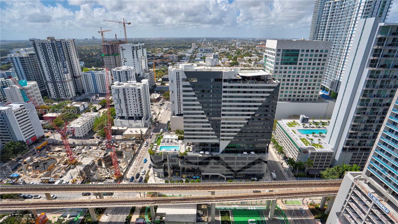 88 Southwest 7th Street, Unit 2706 Miami, FL 33130 - Photo 10 of 58 a view of building with yard