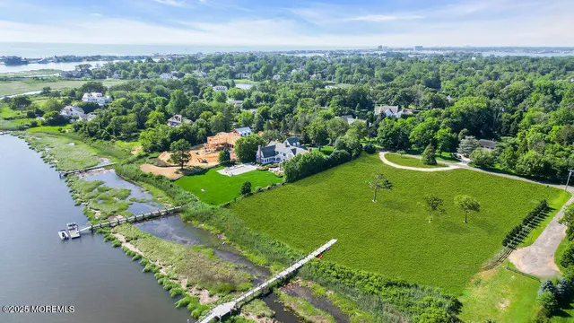 a view of a golf course with parking space