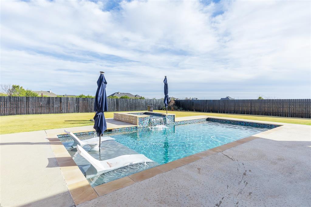 169 Pne Spgs Cove Tuscola, TX 79562 - Photo 30 of 40 a view of swimming pool with outdoor seating