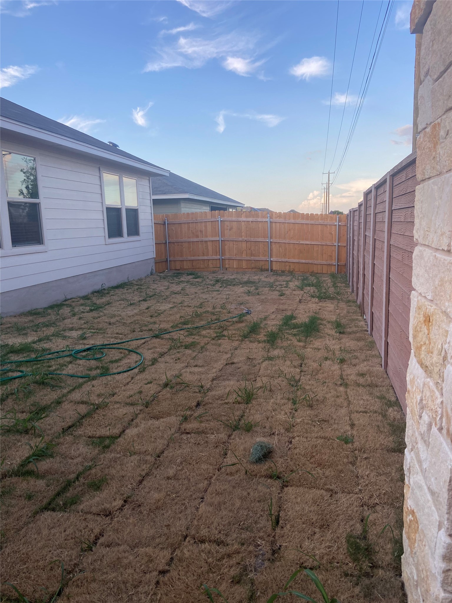 516 Taggart Trail Jarrell, TX 76537 - Photo 10 of 10 A private yard with a fresh privacy fence, ready for personalized landscaping touches.