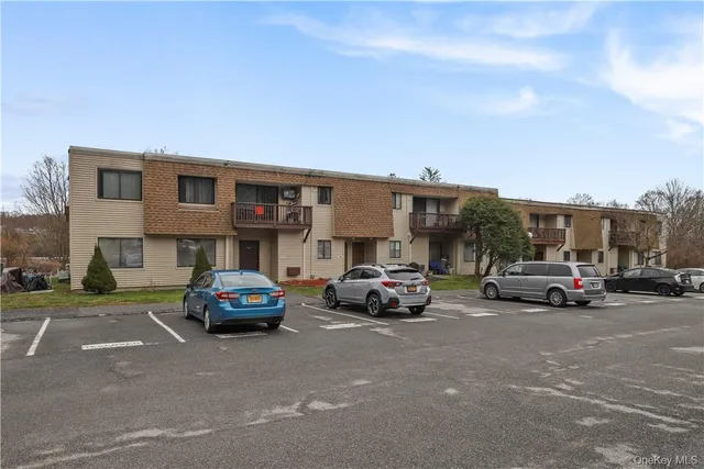 a car parked in front of a building