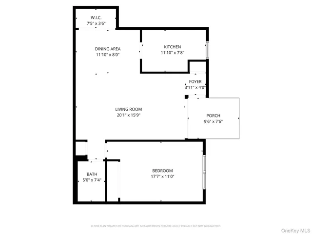 a picture of a bench in front of a wall