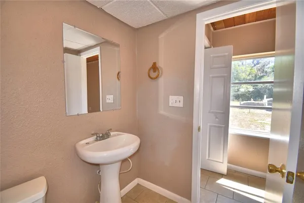 a view of empty room with windows