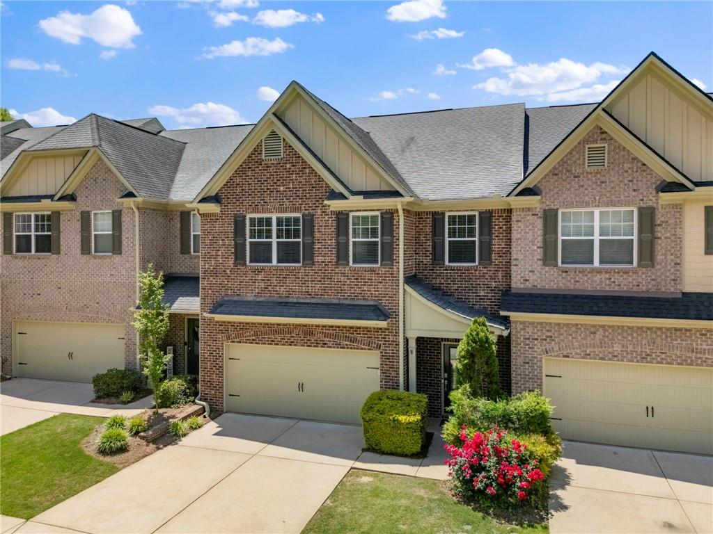 3628 Ashcroft Bend Atlanta, GA 30319 - Photo 2 of 44 a view of a house with a yard