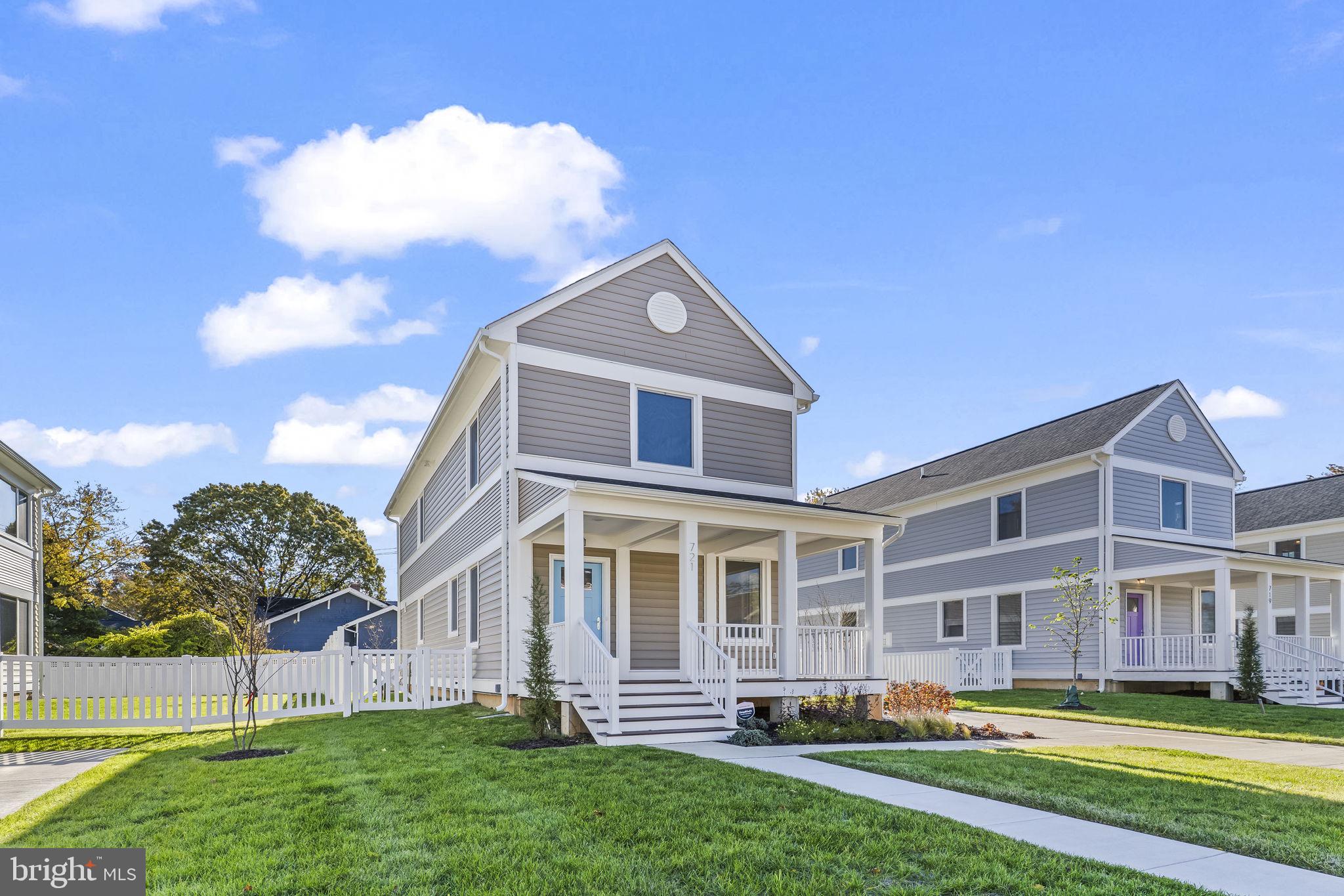 721 60th Place Capitol Heights, MD 20743 - Photo 3 of 33 a front view of a house with a yard