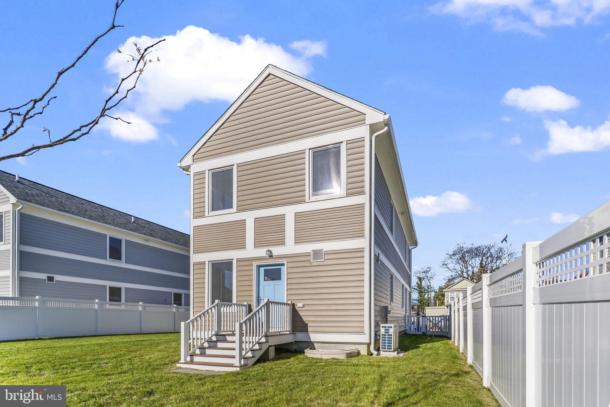 721 60th Place Capitol Heights, MD 20743 - Photo 6 of 33 a view of a house with a yard and furniture