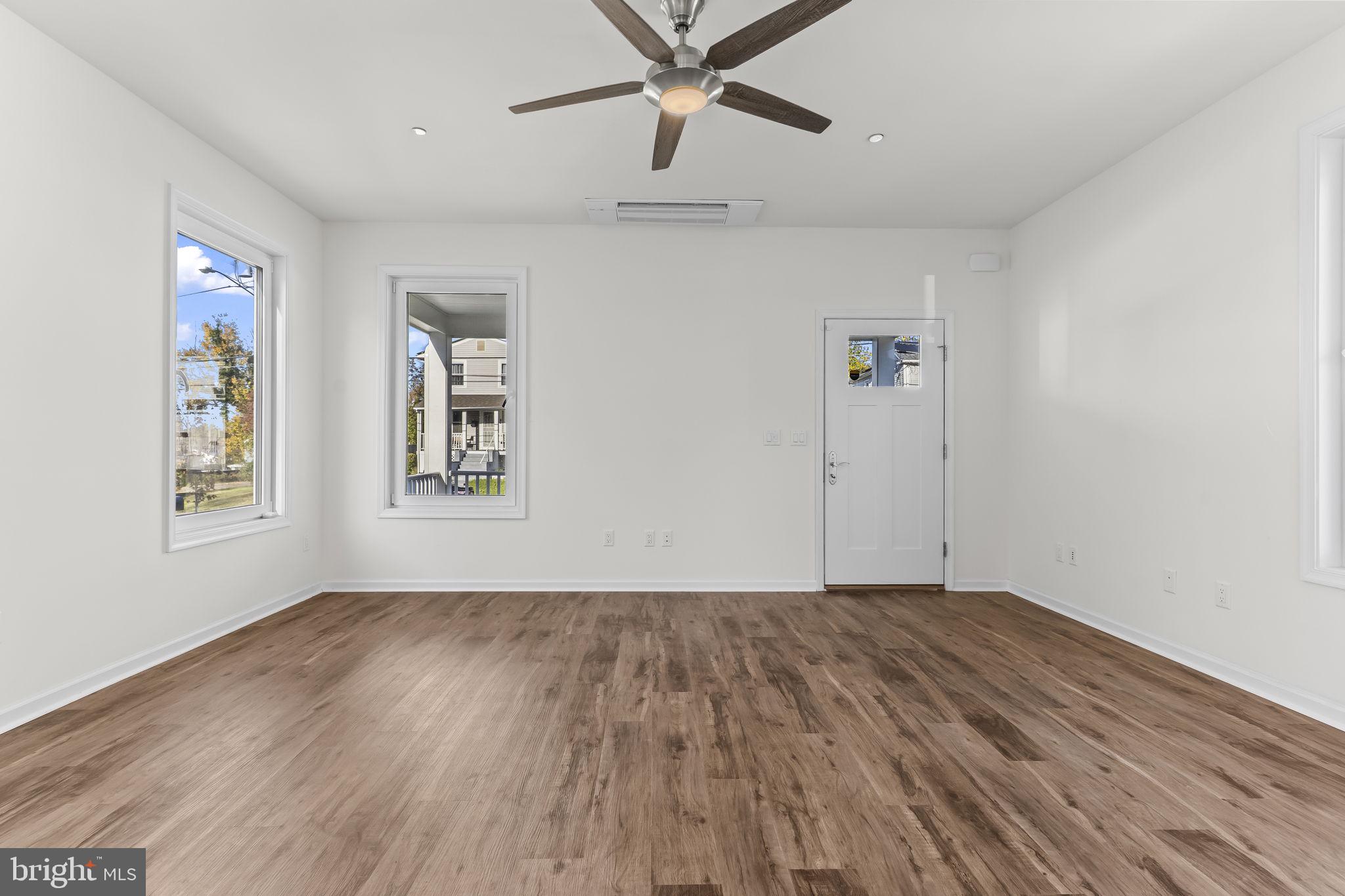 721 60th Place Capitol Heights, MD 20743 - Photo 9 of 33 a view of room with hardwood floor and window