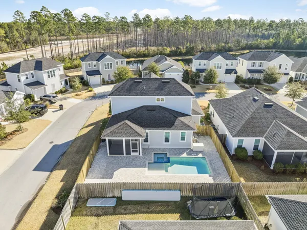 a view of backyard with a patio