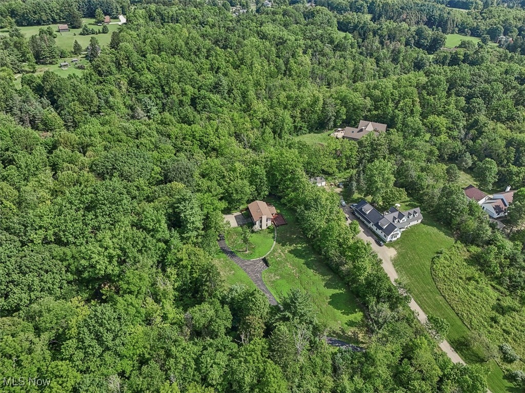 2917 West Bath Road Akron, OH 44333 - Photo 16 of 22 Aerial view of property and surrounding area with a forest