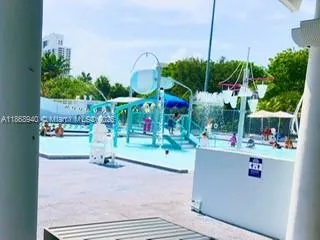 a view of a park with sitting area
