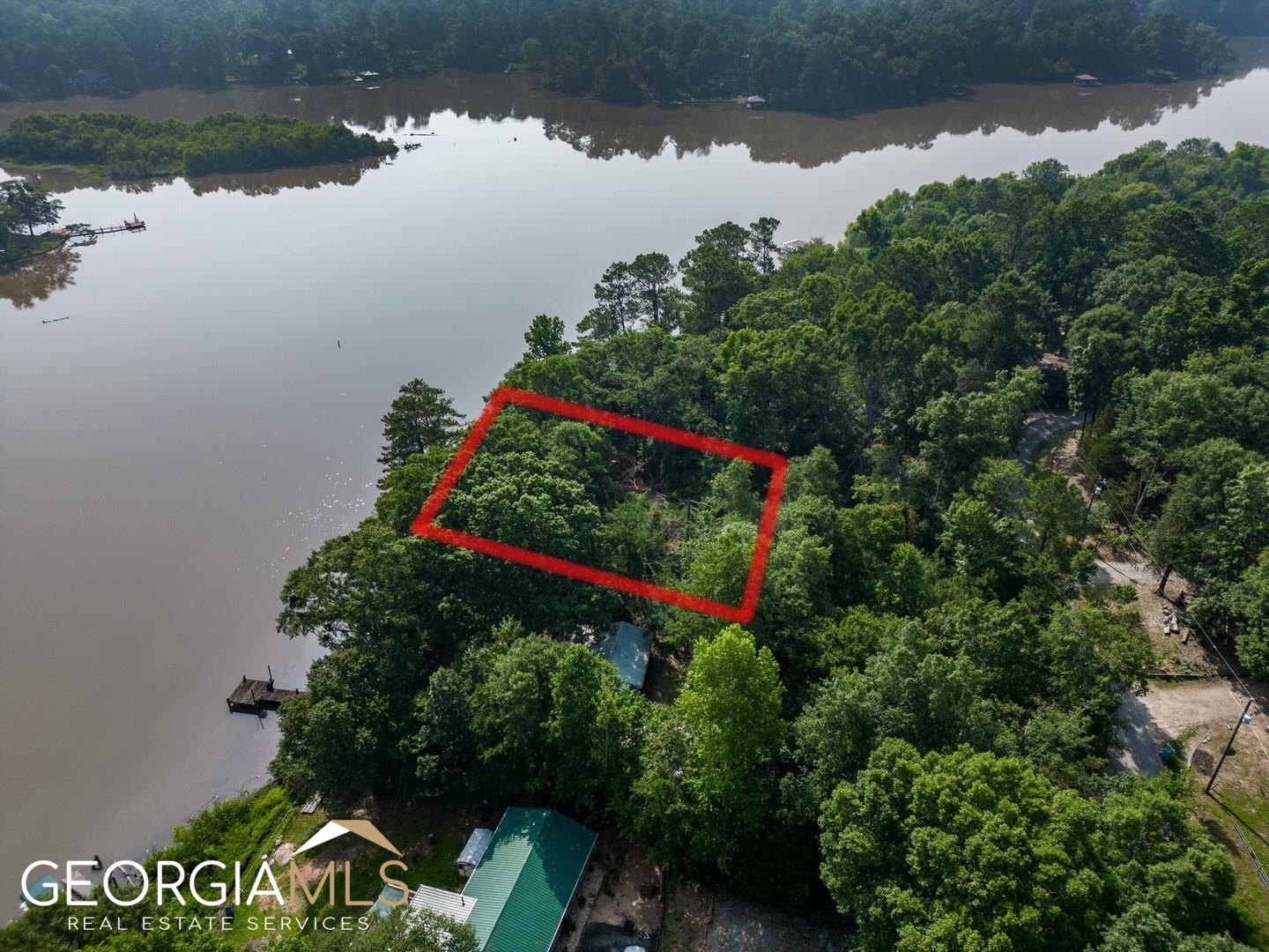 470 Haley Road Jackson, GA 30233 - Photo 2 of 18 an aerial view of a house lake and trees all around