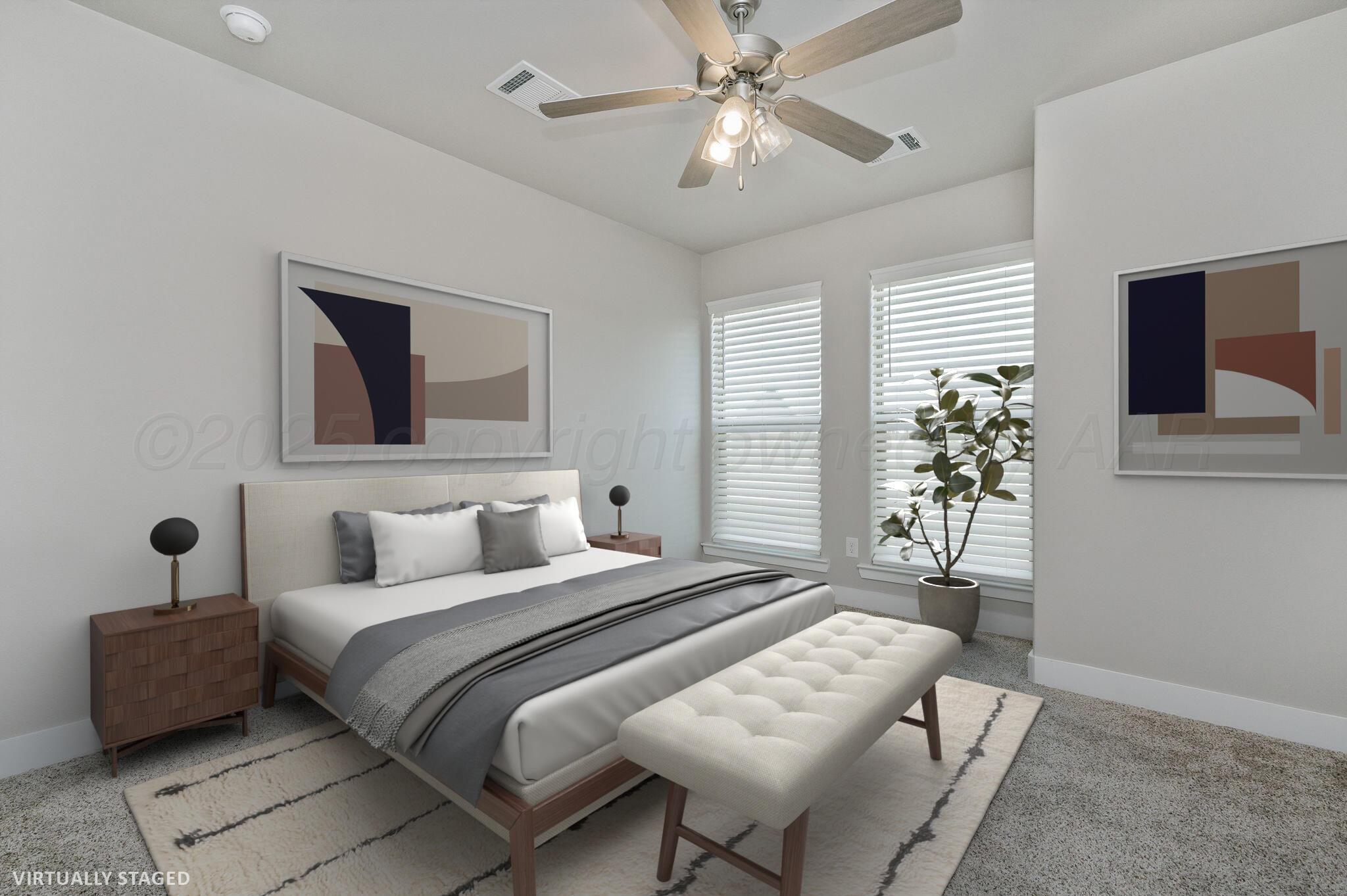 9209 Lexford Drive Amarillo, TX 79119 - Photo 17 of 23 a bedroom with a bed chandelier and a window