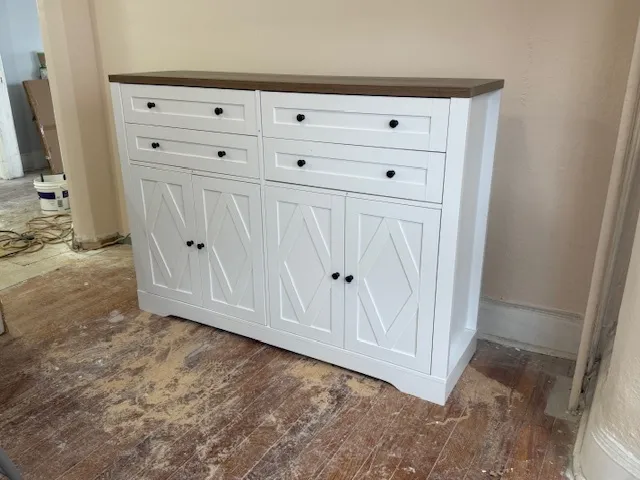 a view of walk in closet with cabinet