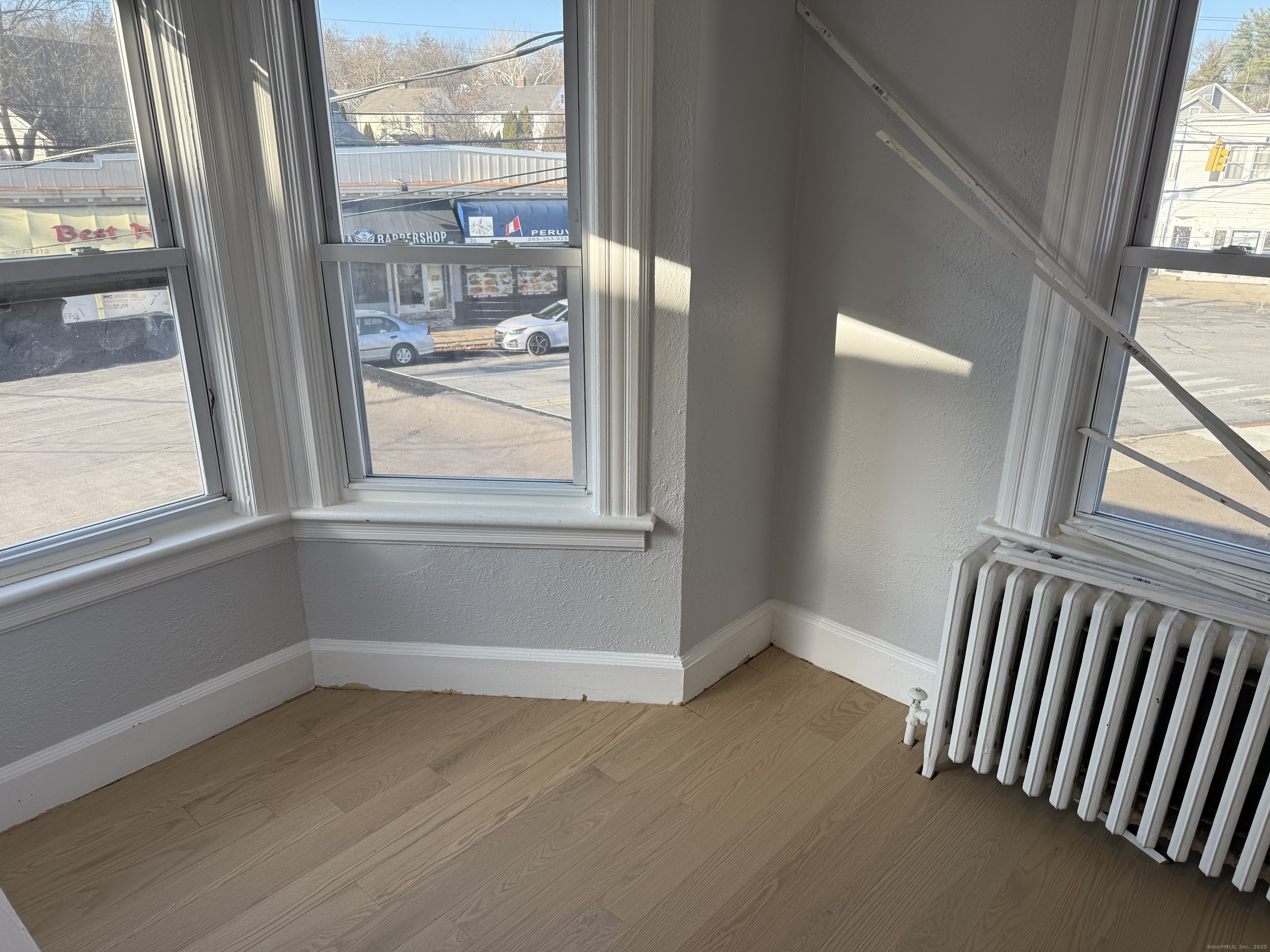 253 Hope Street Stamford, CT 06906 - Photo 6 of 11 a view of empty room with window