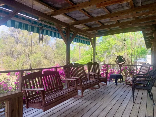 a kitchen with stainless steel appliances a refrigerator sink stove microwave and cabinets