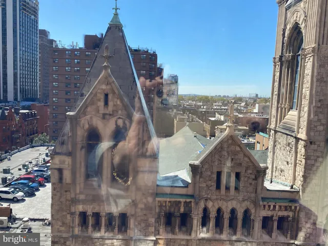 a view of a city with tall buildings