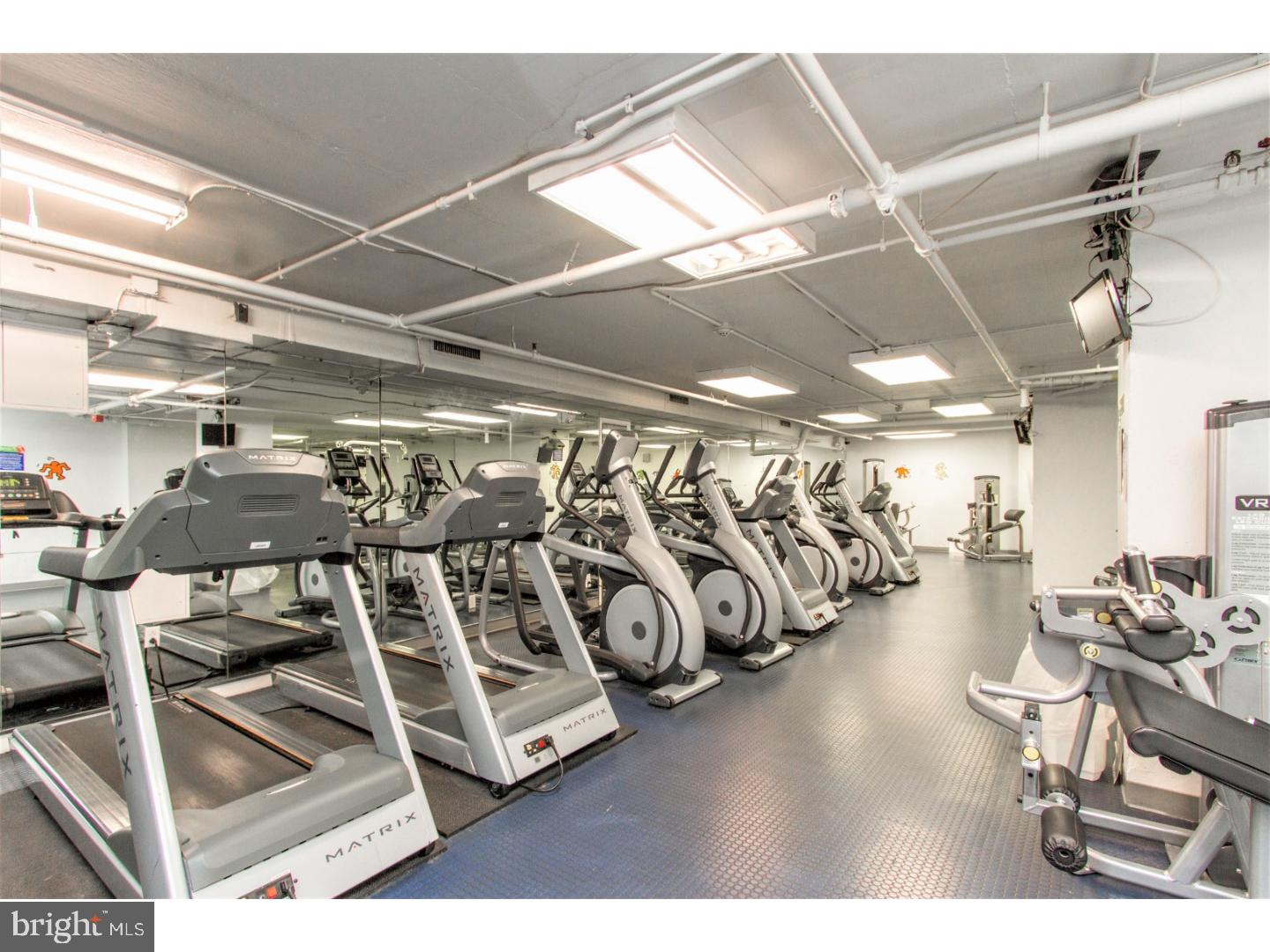 2101 Chestnut Street, Unit 811 Philadelphia, PA 19103 - Photo 3 of 17 a view of a room with gym equipment