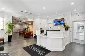 a large white kitchen with lots of counter space