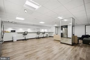 2101 Chestnut Street, Unit 811 Philadelphia, PA 19103 - Photo 6 of 17 a view of a kitchen with a sink and a refrigerator