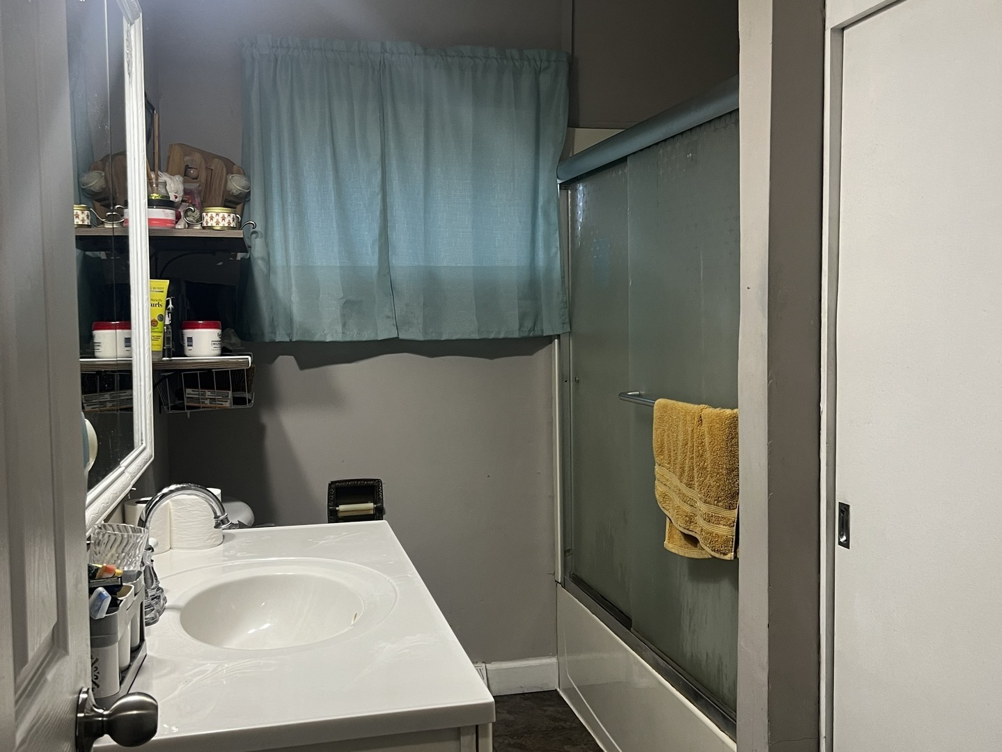 1930 23rd Street Zion, IL 60099 - Photo 11 of 20 a bathroom with a sink toilet and vanity