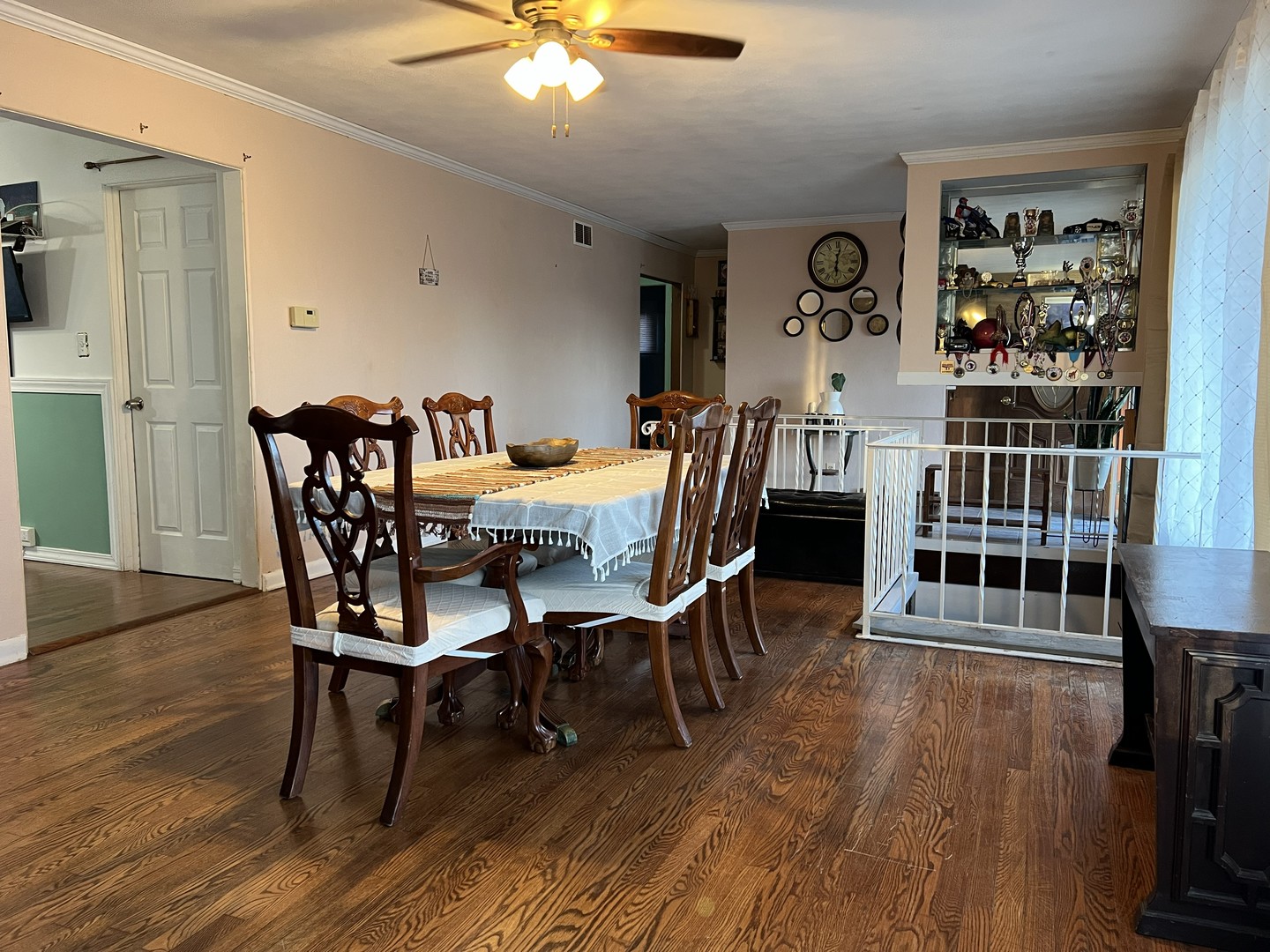 1930 23rd Street Zion, IL 60099 - Photo 4 of 20 a view of a dining room with furniture and wooden floor