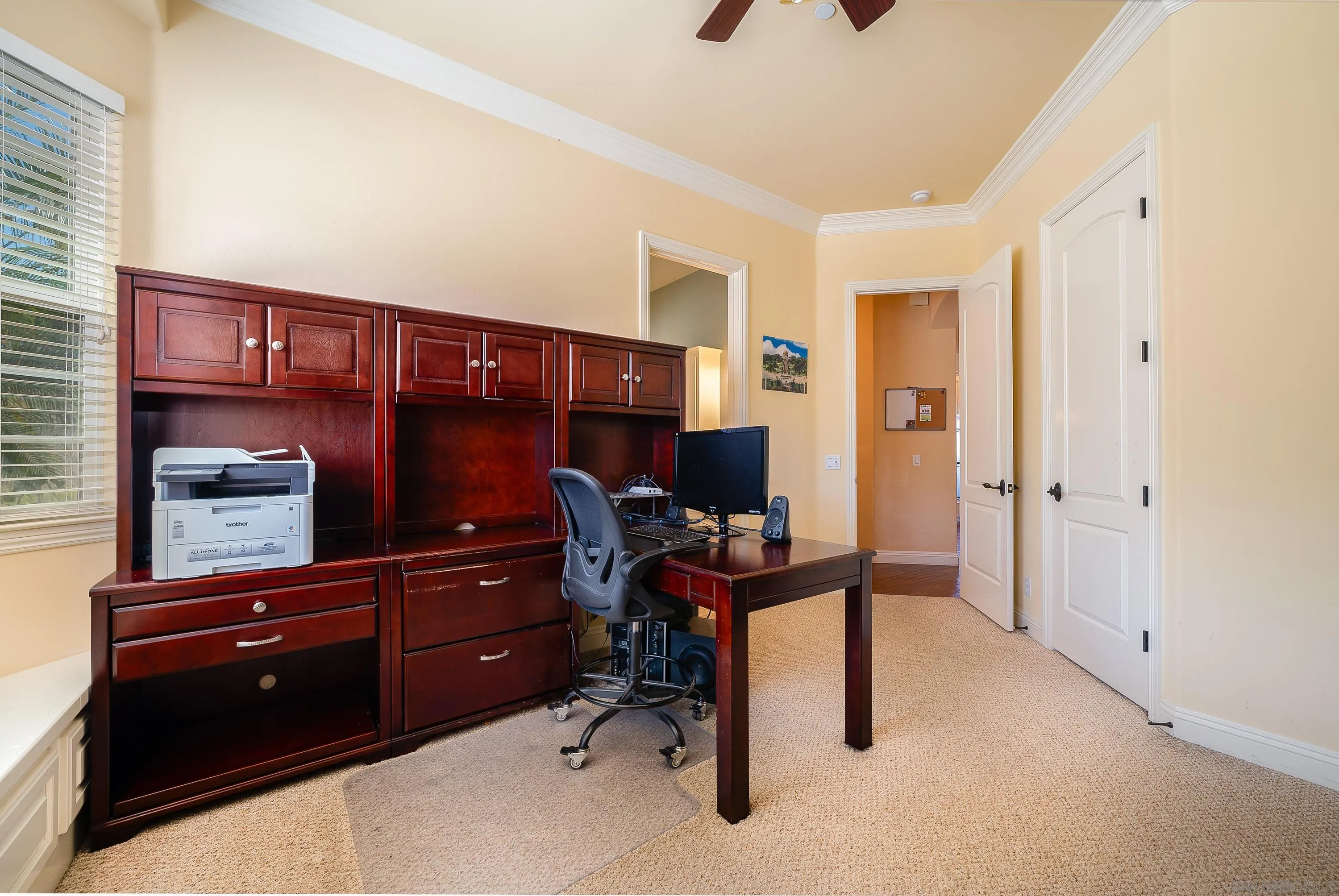 3330 Brooke Hollow Road Fallbrook, CA 92028 - Photo 34 of 67 a room with a cabinets and a chair