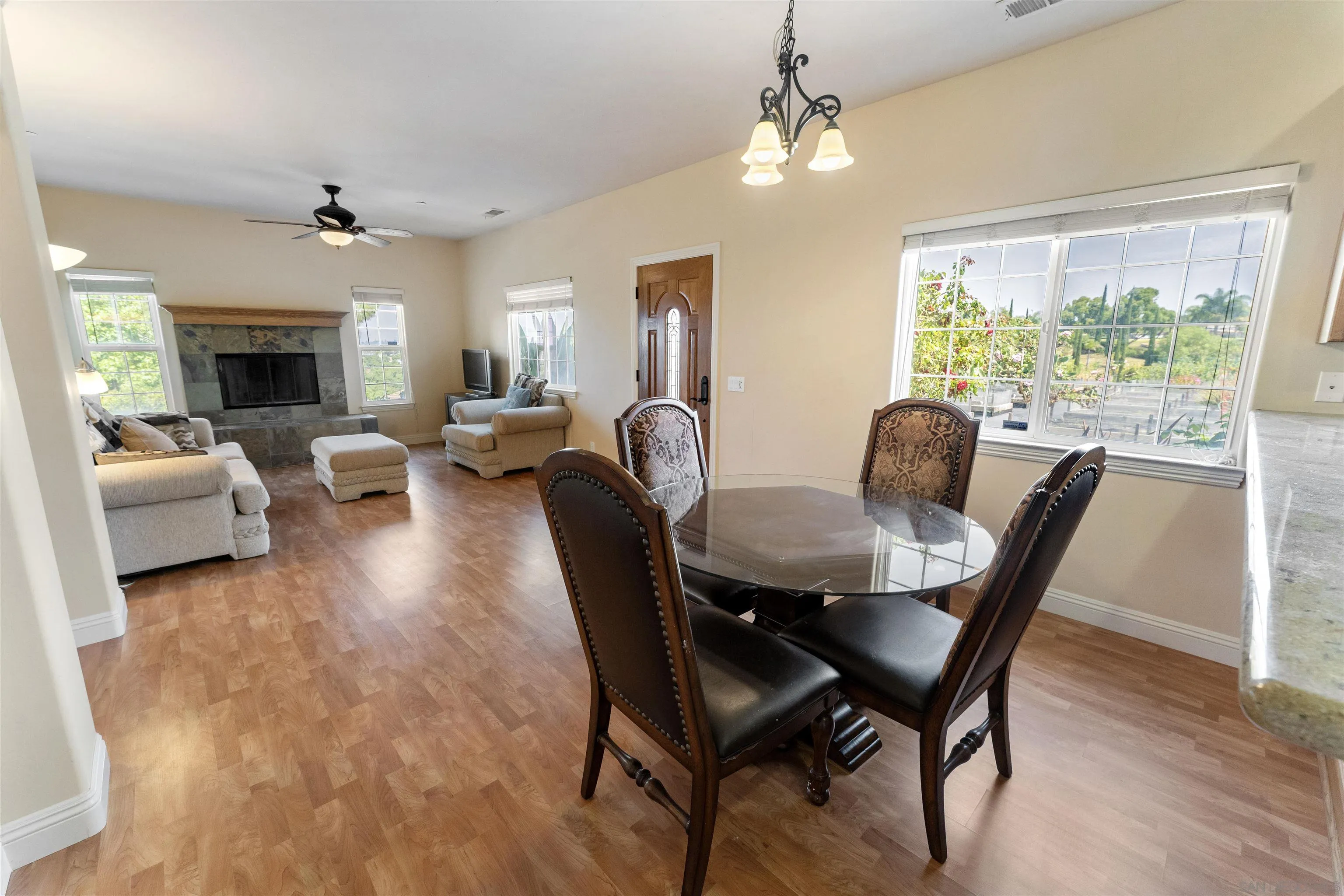 3330 Brooke Hollow Road Fallbrook, CA 92028 - Photo 46 of 67 a view of a livingroom with furniture window and wooden floor