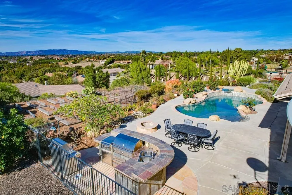 3330 Brooke Hollow Road Fallbrook, CA 92028 - Photo 58 of 67 a view of a chairs and table in a patio