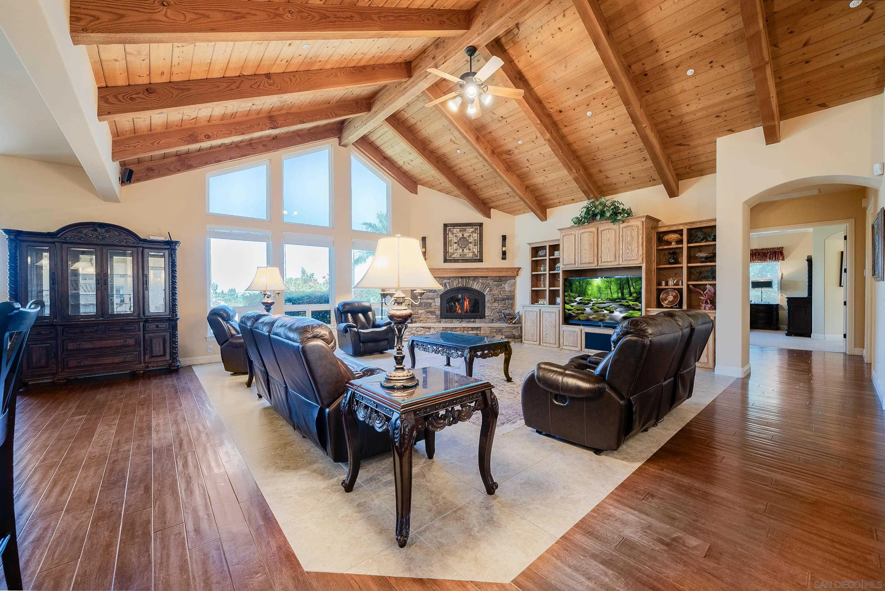 3330 Brooke Hollow Road Fallbrook, CA 92028 - Photo 10 of 67 a living room with furniture a wooden floor and a large window