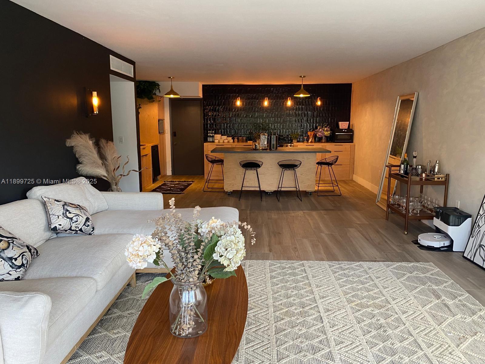 550 Ocean Drive, Unit 2D Key Biscayne, FL 33149 - Photo 2 of 35 a lobby with furniture and chandelier