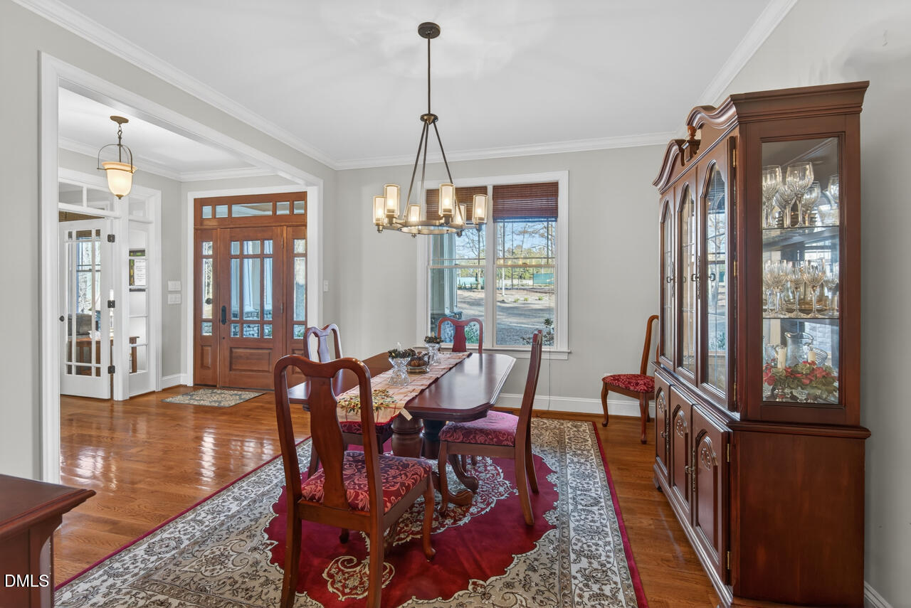 10775 Buffalo Creek Road Rougemont, NC 27572 - Photo 11 of 65 a view of a dining room with furniture and window