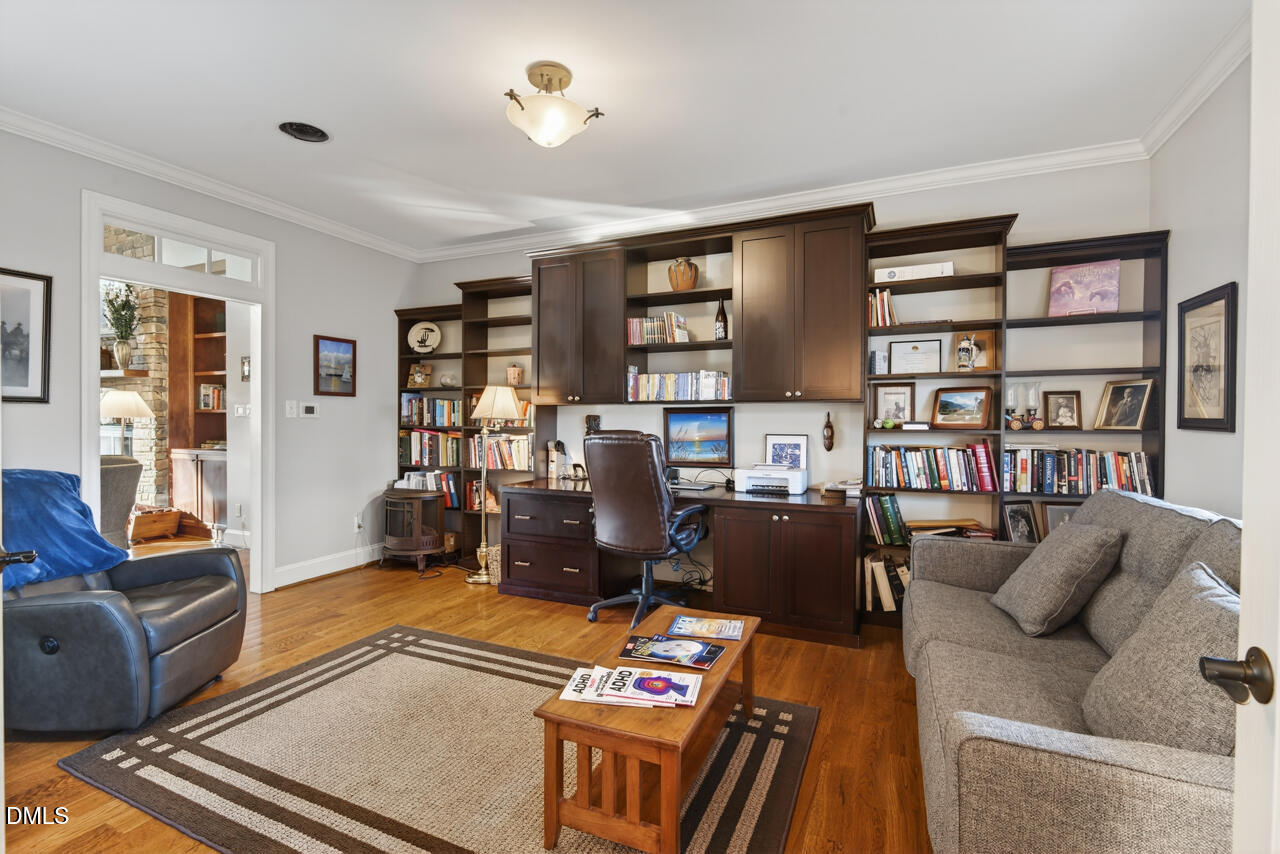 10775 Buffalo Creek Road Rougemont, NC 27572 - Photo 13 of 65 a living room with furniture and a flat screen tv