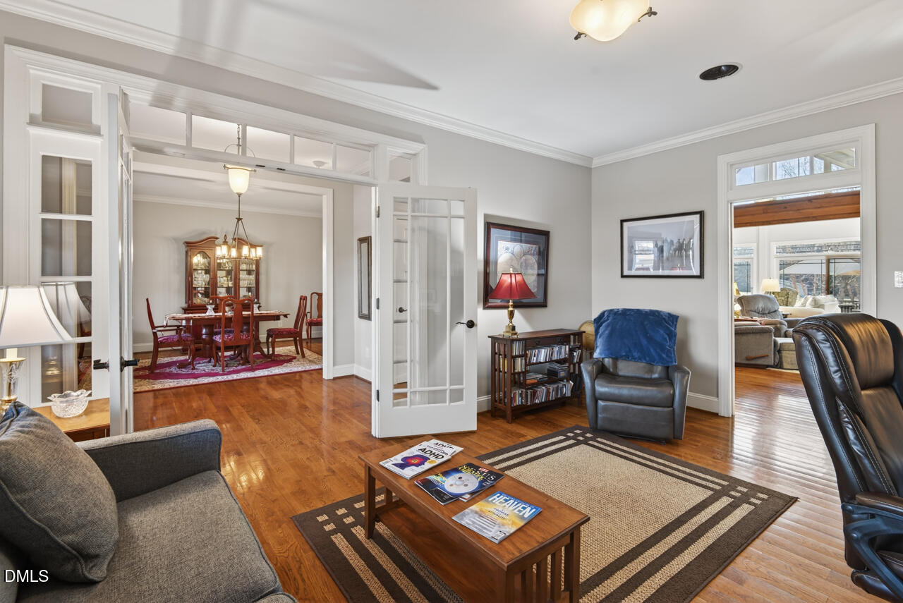 10775 Buffalo Creek Road Rougemont, NC 27572 - Photo 16 of 65 a living room with furniture and a table