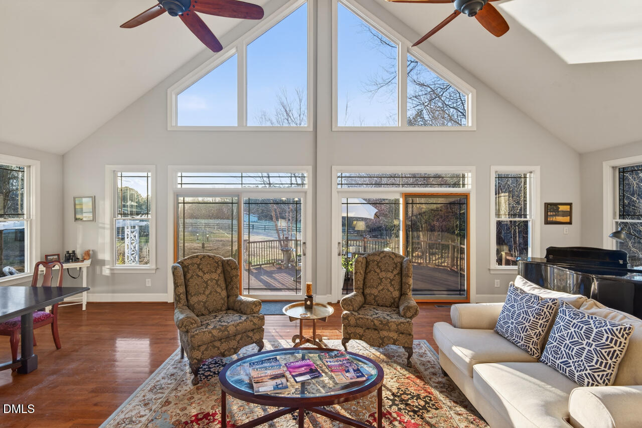 10775 Buffalo Creek Road Rougemont, NC 27572 - Photo 18 of 65 a living room with furniture and a large window