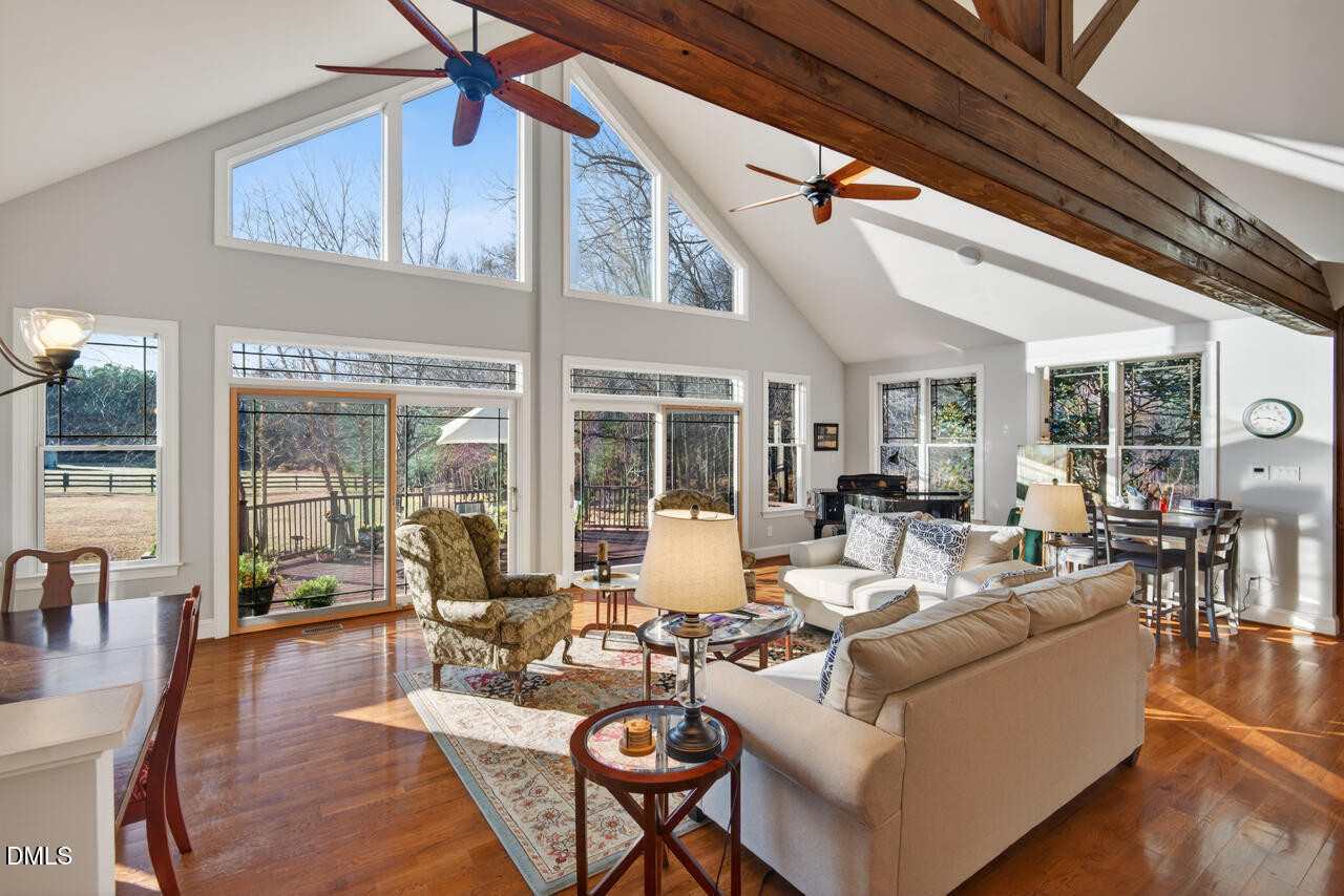 10775 Buffalo Creek Road Rougemont, NC 27572 - Photo 21 of 65 a living room with furniture and a large window