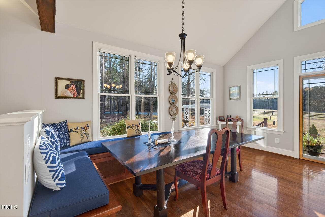 10775 Buffalo Creek Road Rougemont, NC 27572 - Photo 22 of 65 a view of a dining room with furniture window and wooden floor