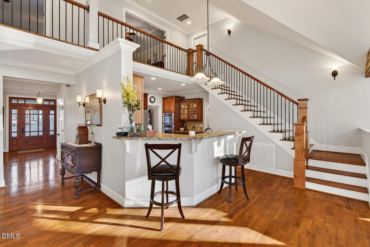 10775 Buffalo Creek Road Rougemont, NC 27572 - Photo 24 of 65 a view of entryway and hall with wooden floor
