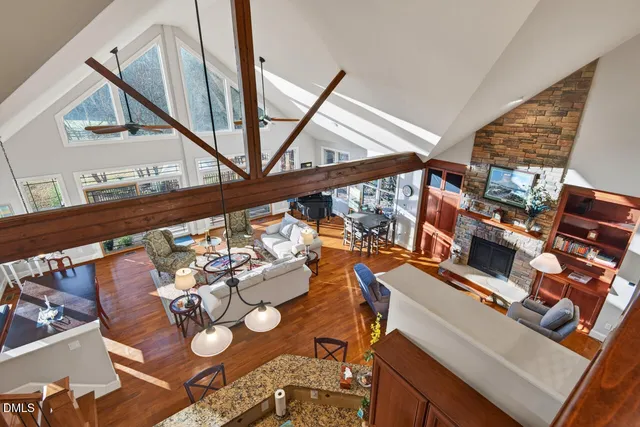 a spacious bathroom with a granite countertop sink and a mirror